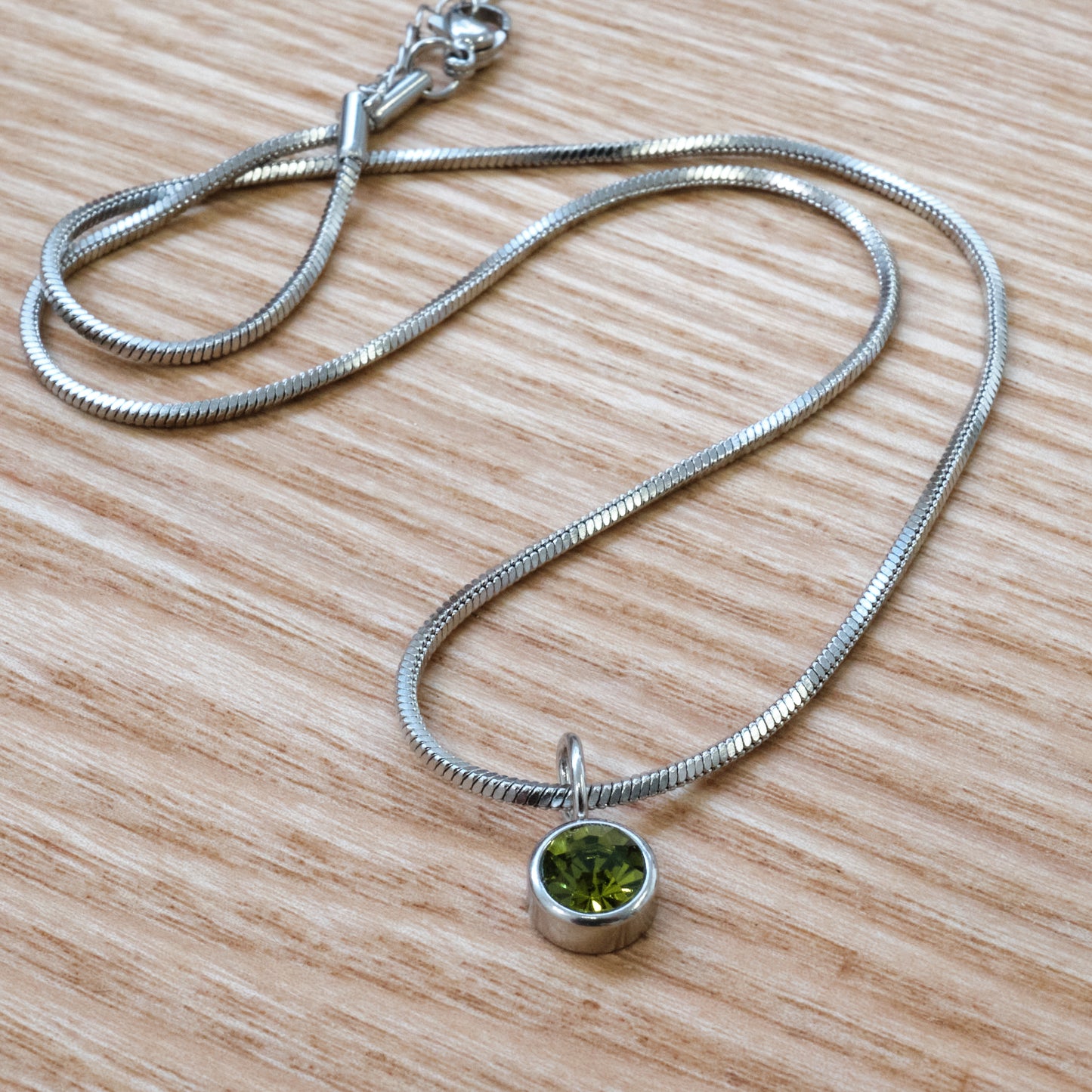 Stainless Steel Snake Chain Necklace with Green Crystal Pendant SKU (184)